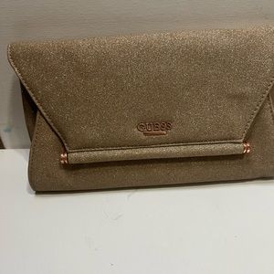 Glittery Gold Guess nightlife Purse/Clutch with gold chain strap Preowned